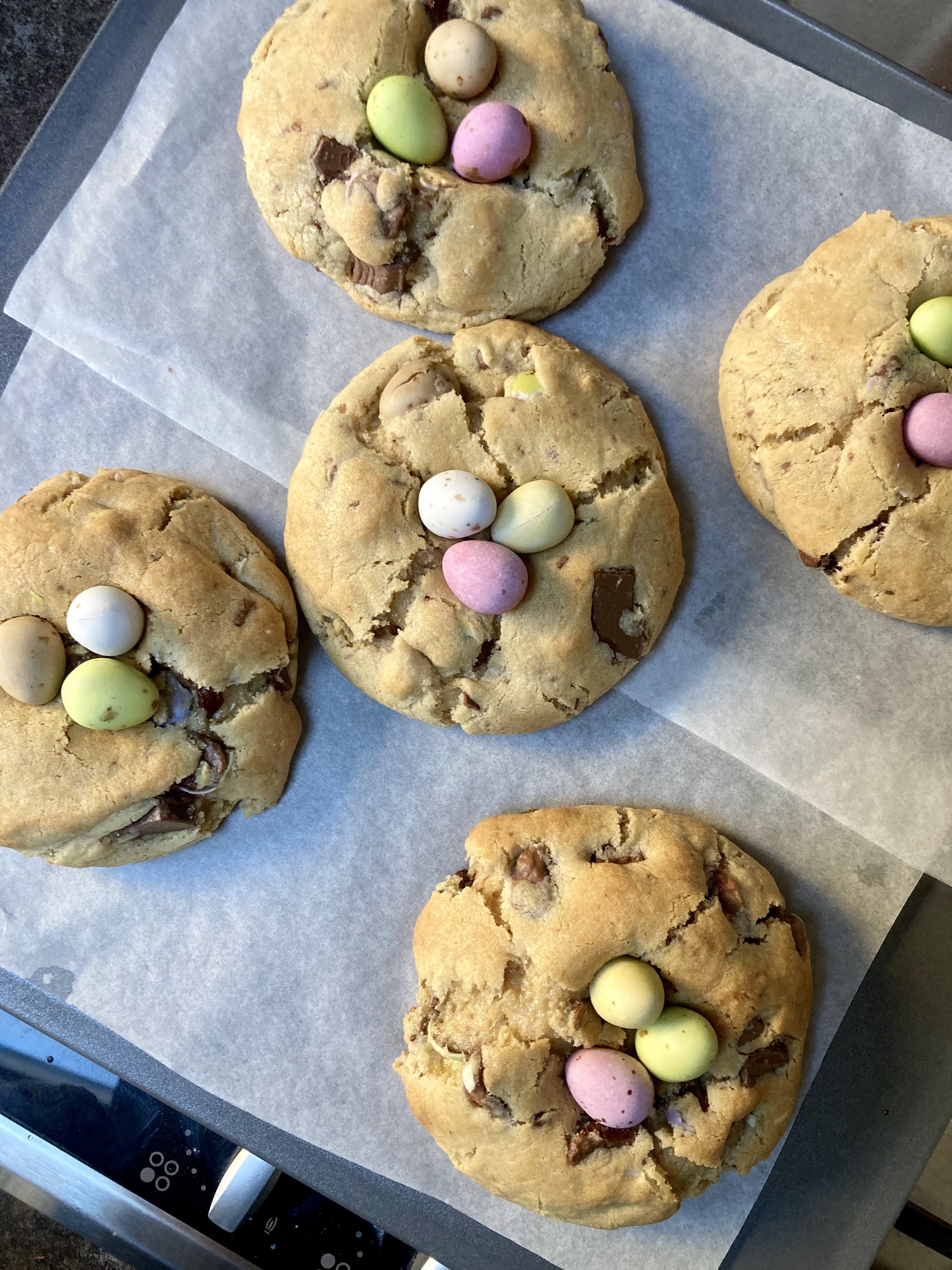Cookies topped with colourful chocolate eggs